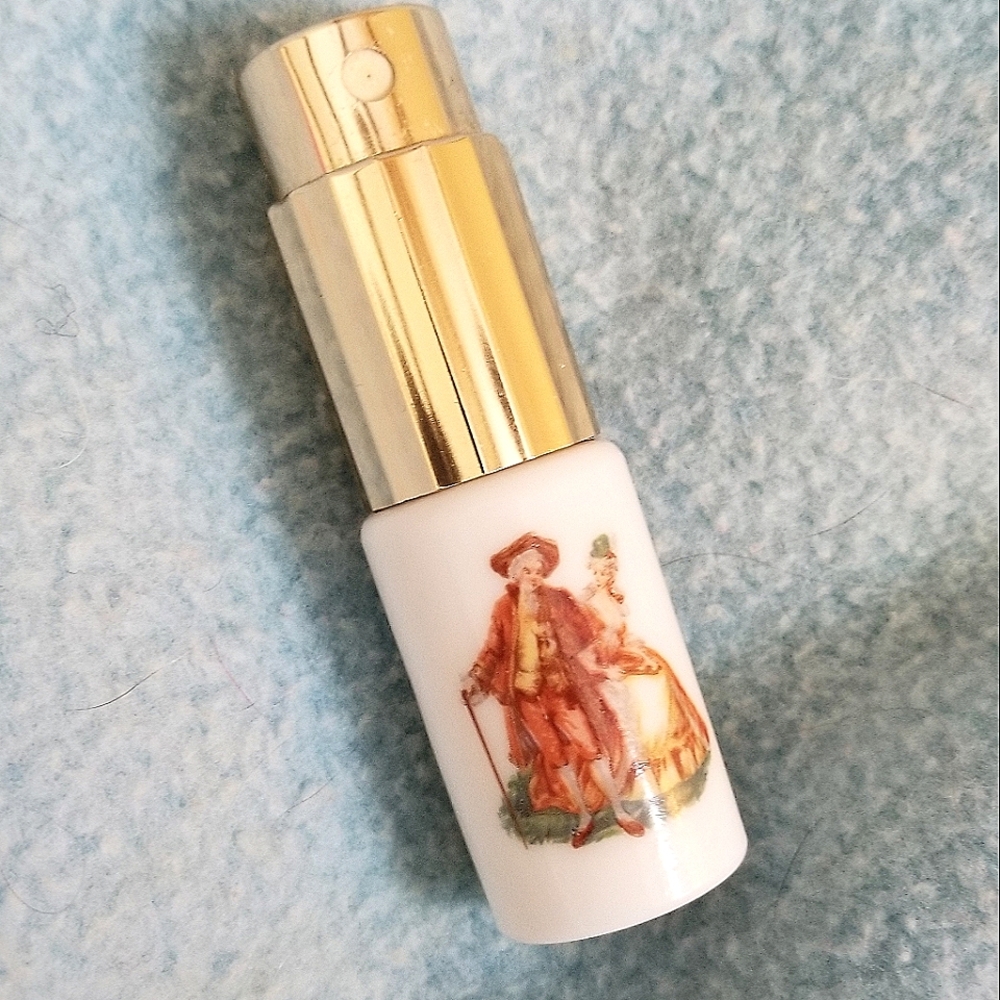 Purse sized perfume atomizer.
